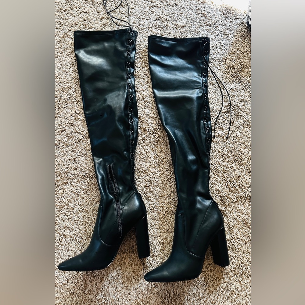 Knee length boots.